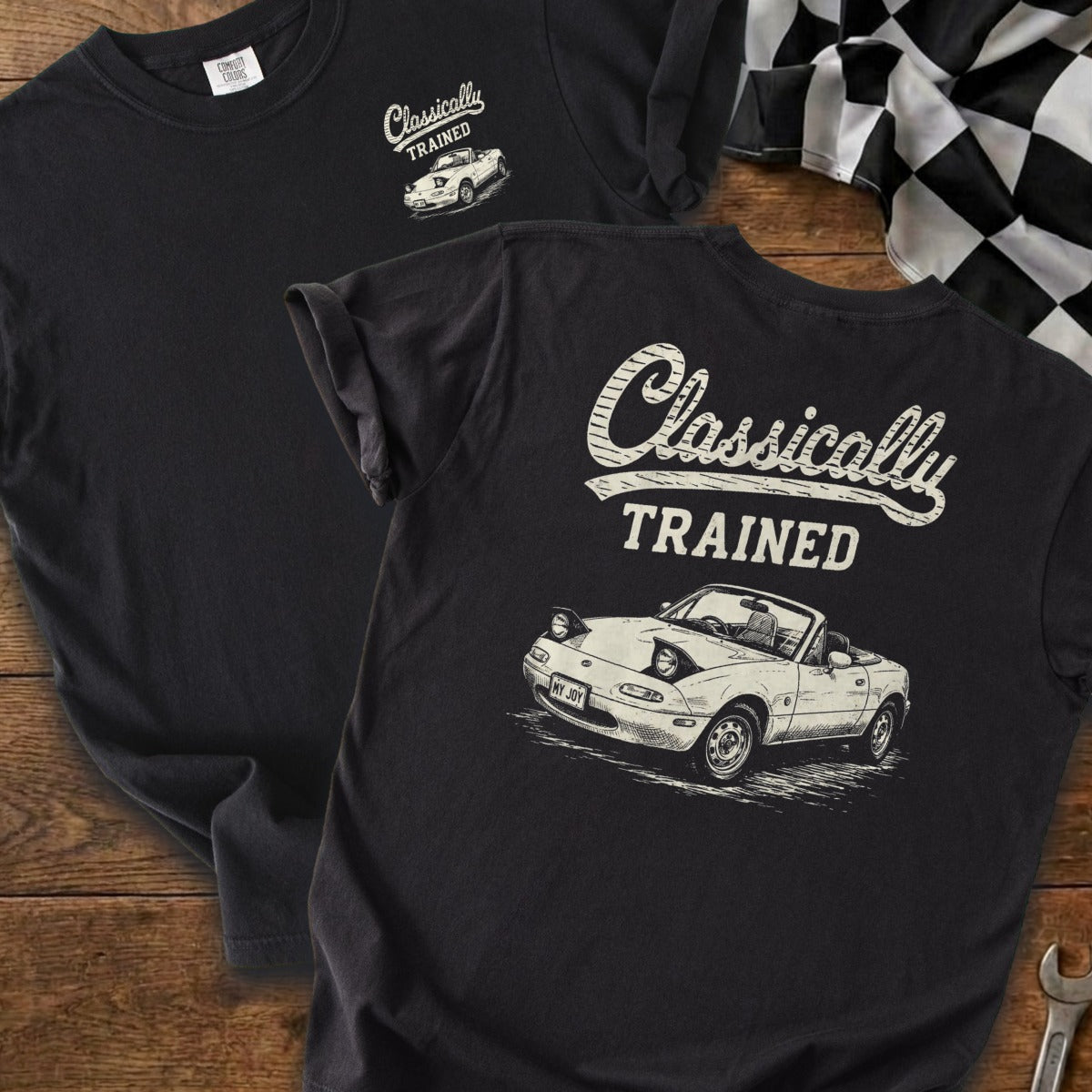 T-shirt with sketch of a convertible car and text "Classically TRAINED".