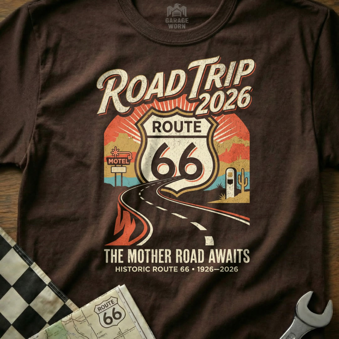 Brown t-shirt with Route 66 "Road Trip 2026" graphic and text.