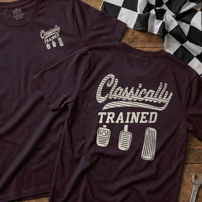 Burgundy t-shirt with "Classically TRAINED" and three pedals graphic.