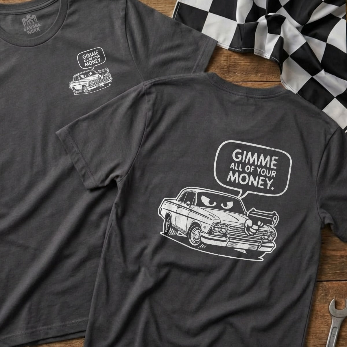 Dark t-shirt with cartoon car and text "GIMME ALL OF YOUR MONEY."