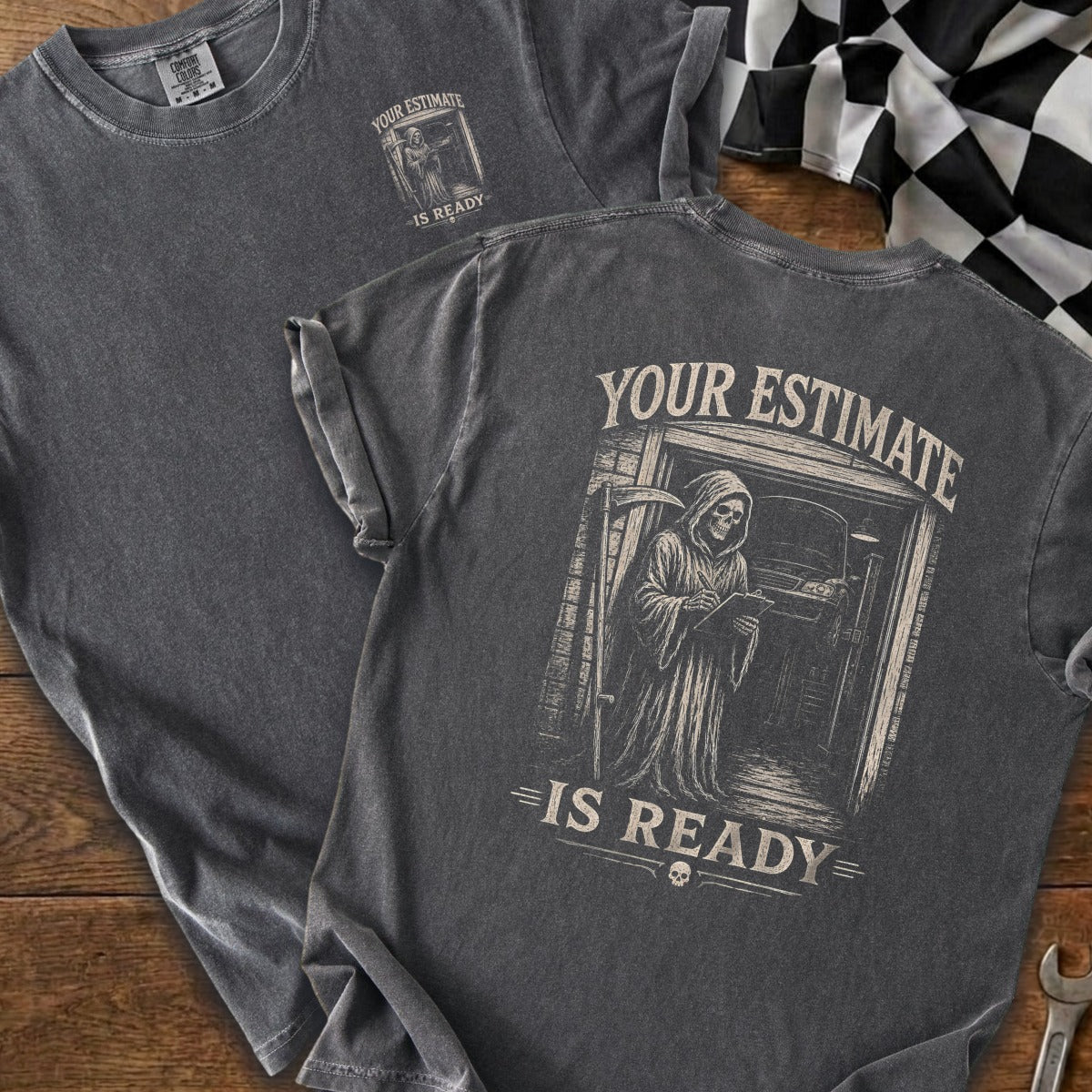 Dark gray t-shirt with grim reaper holding clipboard and scythe graphic.