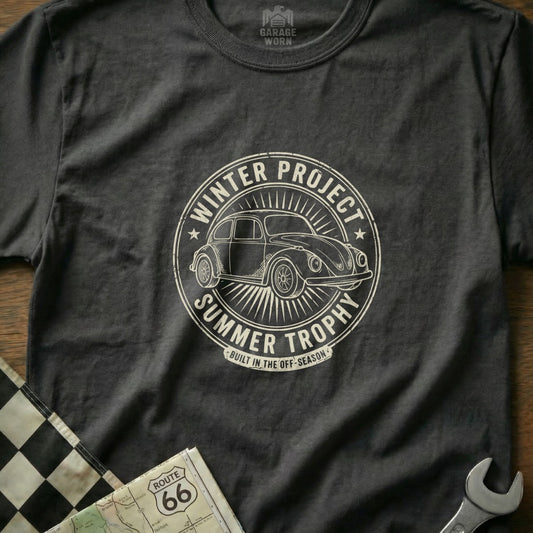 Dark grey t-shirt with "Winter Project Summer Trophy" circular graphic and a classic Beetle.