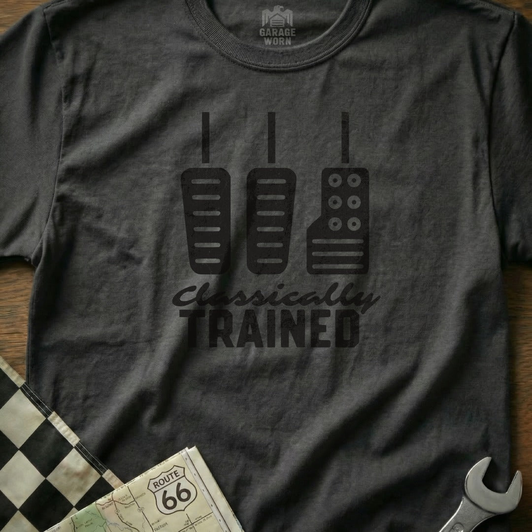 Dark grey t-shirt with black pedal graphic and "Classically Trained" text.
