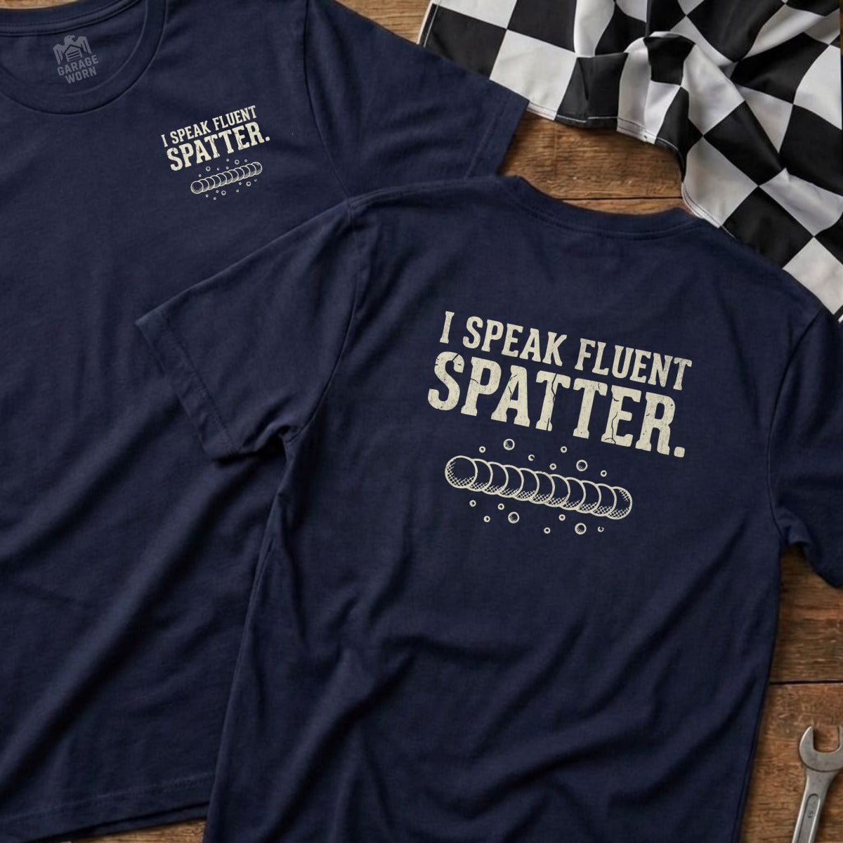 Navy t-shirt with "I SPEAK FLUENT SPATTER" and welding graphic.