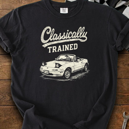Black t-shirt with "Classically TRAINED" and drawing of a white convertible Miata.