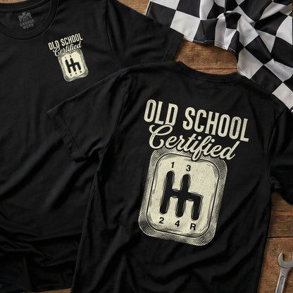T-shirt with "Old School Certified" text and a manual transmission shift pattern graphic.