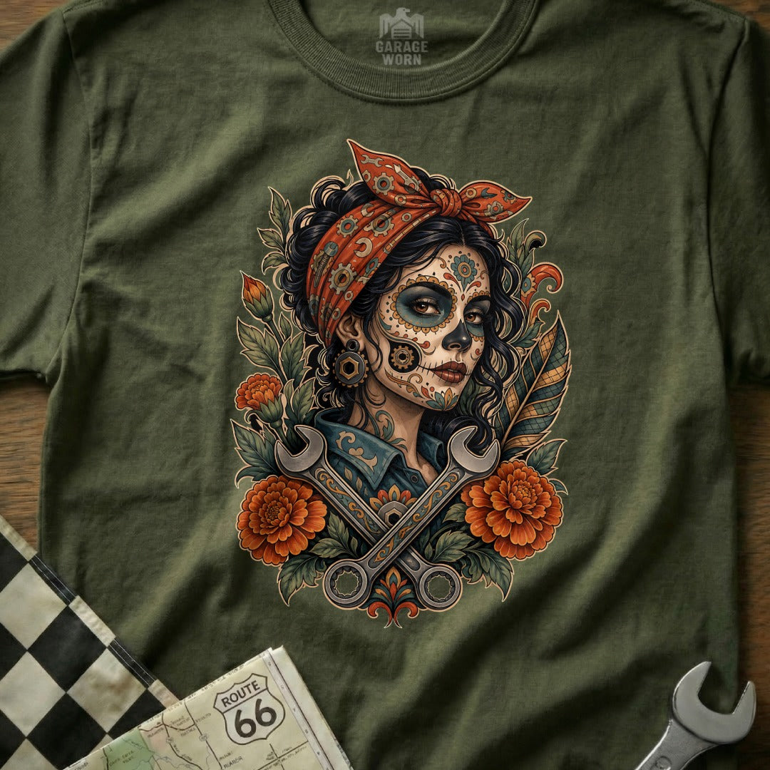 Day of the Dead inspired woman with wrenches and flowers.