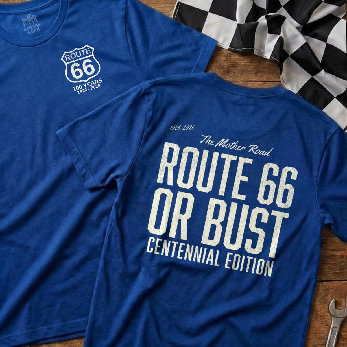 Blue t-shirt with "Route 66" logo on front, "Route 66 Or Bust Centennial Edition" on back.