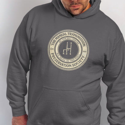 Grey hoodie with a circular graphic showcasing a manual transmission shift pattern.