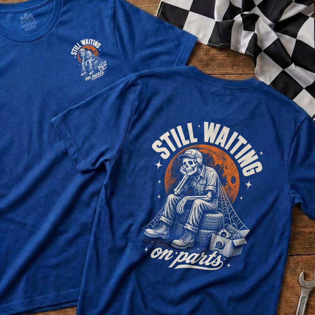 Skeleton sitting on tire with "Still Waiting on Parts" text.