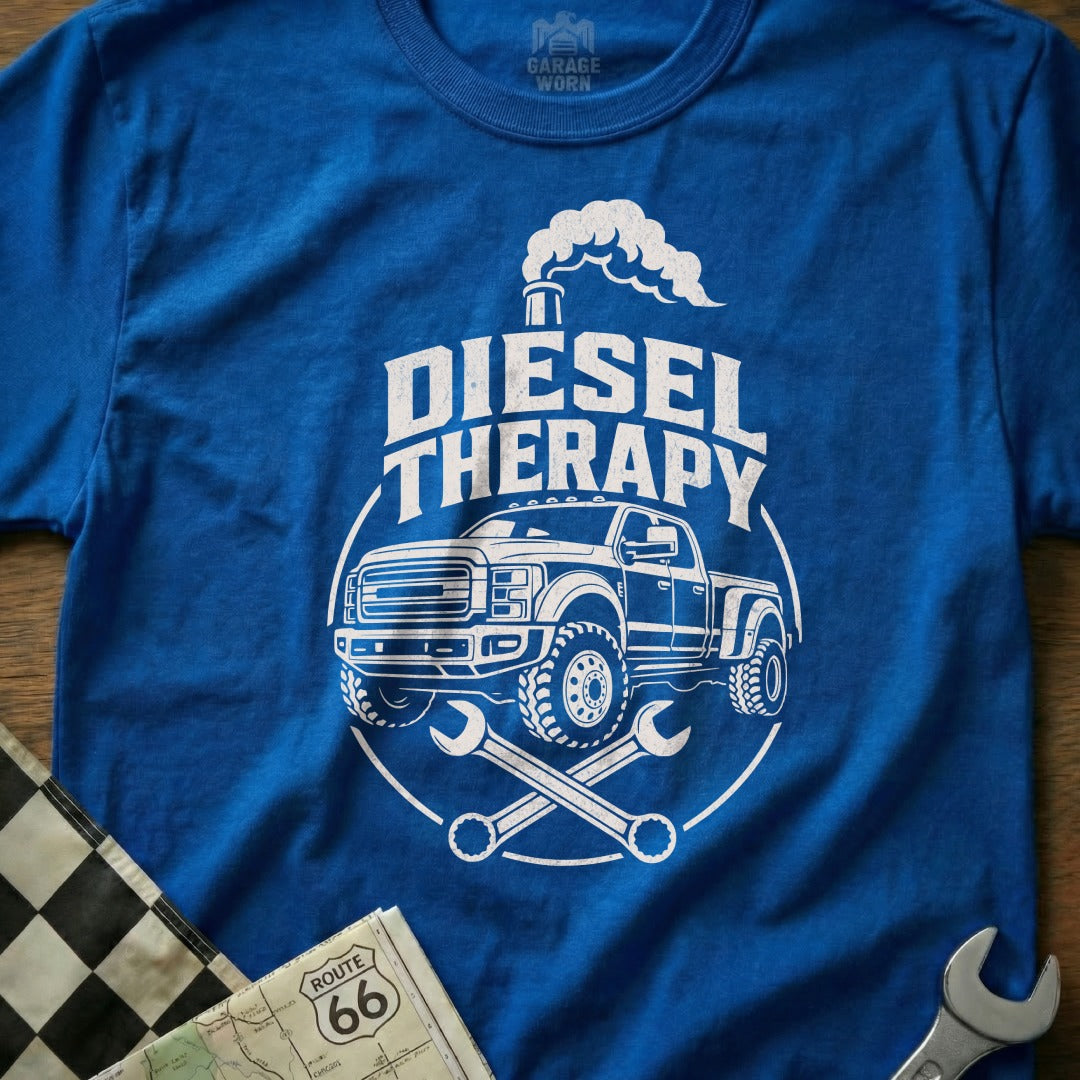 Blue t-shirt with "DIESEL THERAPY" text, a lifted pickup truck, and wrenches.