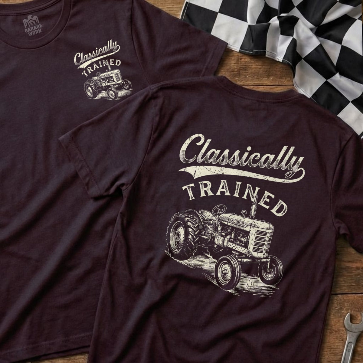 T-shirts with "Classically Trained" text and vintage tractor graphic on wood background.