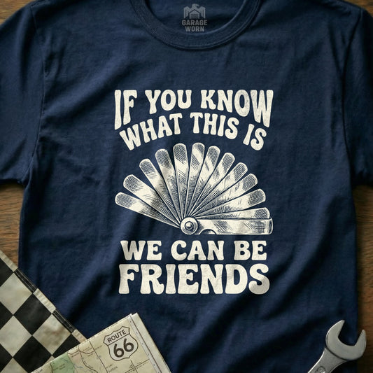 Navy t-shirt with "If you know what this is we can be friends" and a gap gauge.