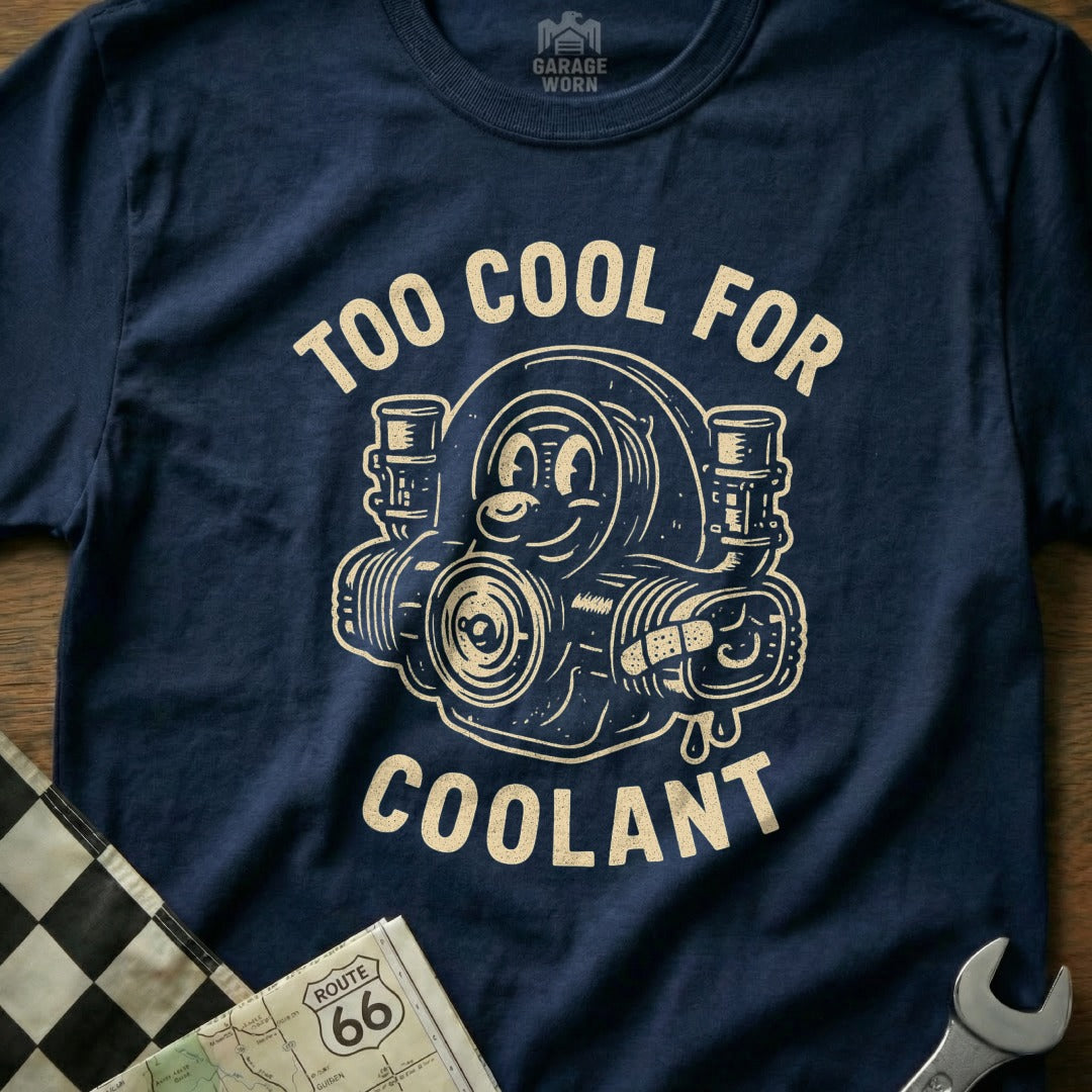 Navy t-shirt with "Too Cool for Coolant" text and cartoon engine part illustration.