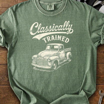 Green t-shirt with white text "Classically TRAINED" and sketched vintage pickup truck.