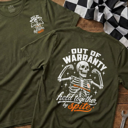 Green t-shirt with skeleton graphic and text "Out of Warranty Held Together By Spite".