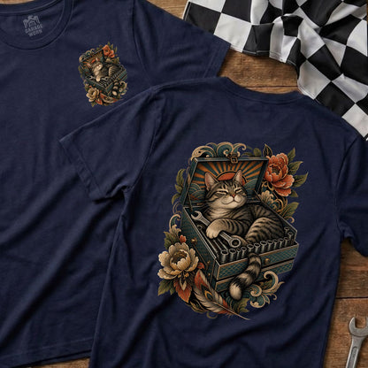 Tabby cat in toolbox with wrenches and floral design on navy t-shirt.