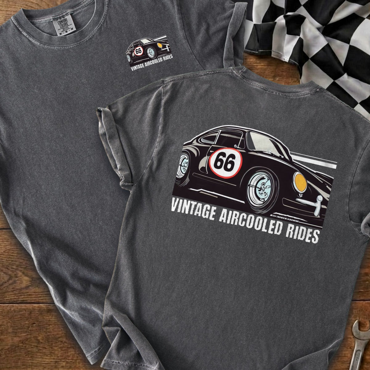 Dark t-shirt with graphic of a black vintage car with number 66 on door.
