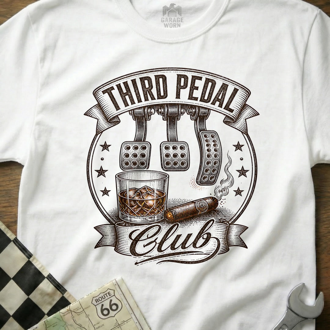 White t-shirt with "Third Pedal Club" text, car pedals, whiskey, and cigar graphic.