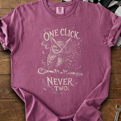 Maroon t-shirt with distressed owl graphic holding a wrench and text "ONE CLICK NEVER TWO".