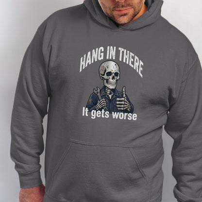 Skeleton wearing overalls and holding wrench with text "Hang in there. It gets worse."