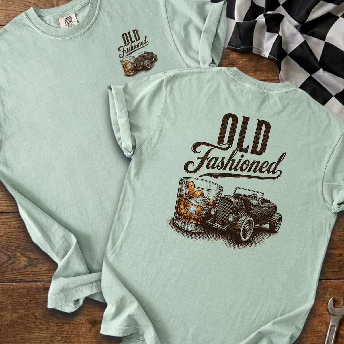 Light blue t-shirt with "Old Fashioned" text, whiskey glass, and hot rod graphic.