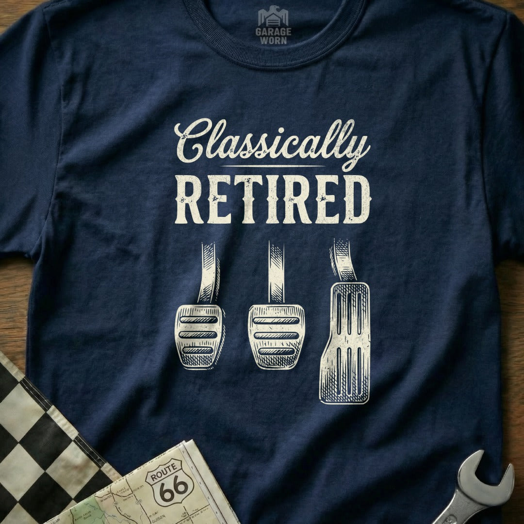 Navy blue t-shirt with "Classically Retired" and three pedals.