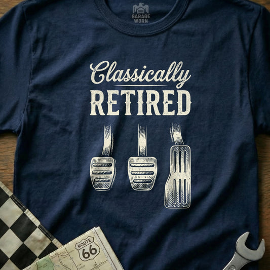 Navy blue t-shirt with "Classically Retired" and three pedals.