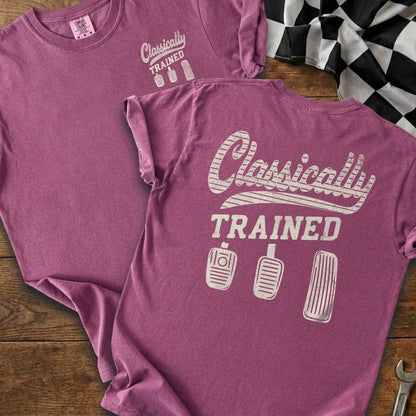 T-shirt with "Classically TRAINED" graphic and three gear shift pedals.