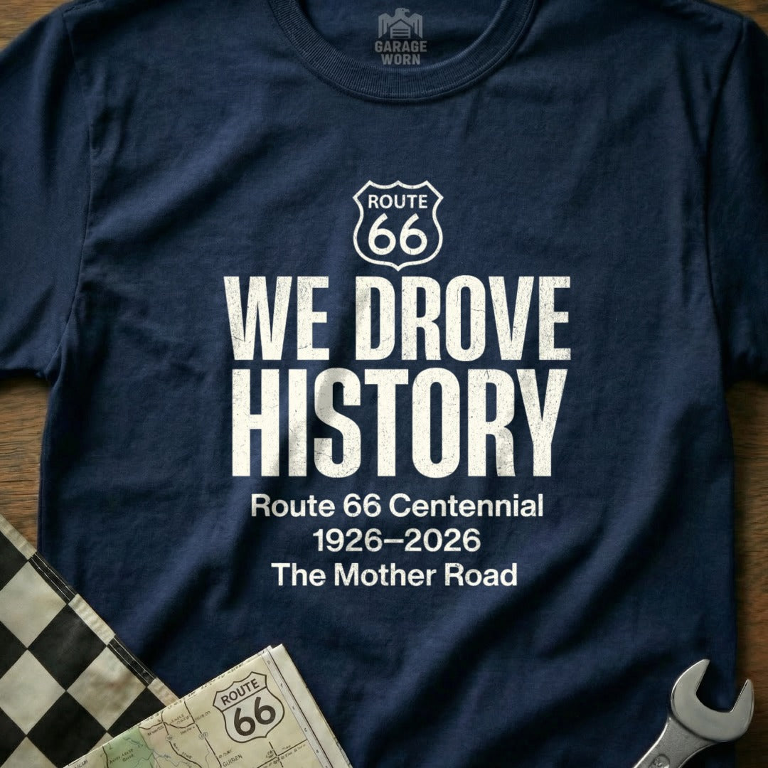 Navy t-shirt with "WE DROVE HISTORY Route 66 Centennial 1926-2026 The Mother Road" text.