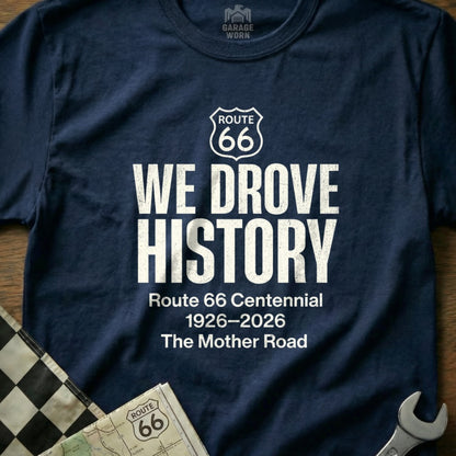 Navy t-shirt with "WE DROVE HISTORY Route 66 Centennial 1926-2026 The Mother Road" text.