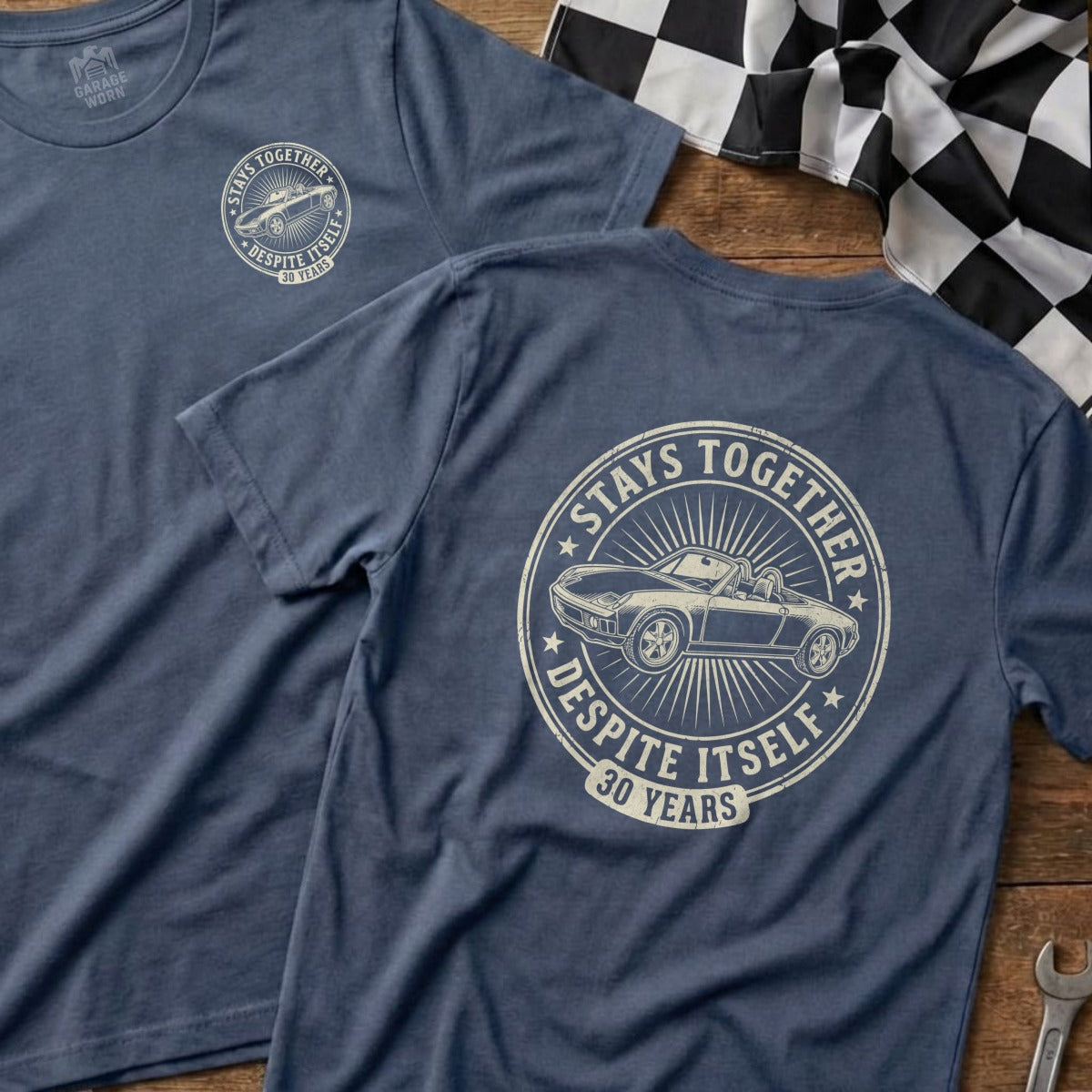 Blue t-shirt with "Stays Together Despite Itself 30 Years" text and car graphic.