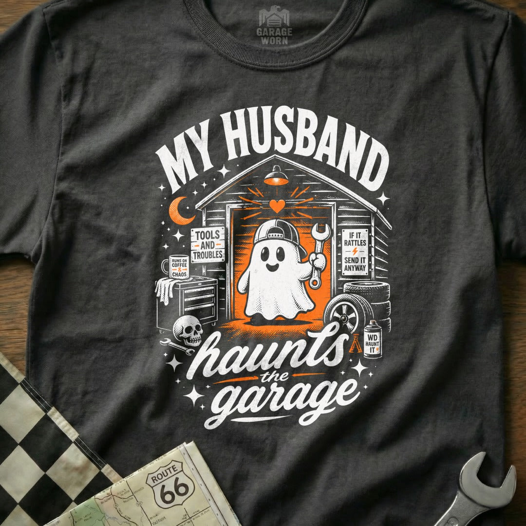 T-shirt graphic: "My Husband Haunts the Garage" with a ghost mechanic.