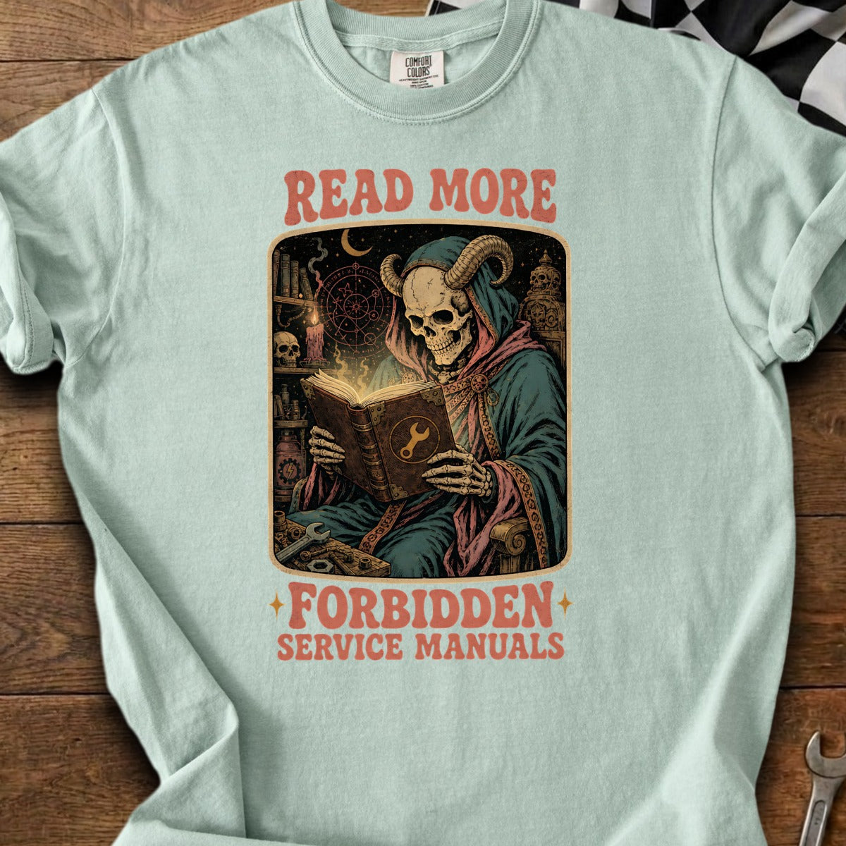 Skeleton with horns reading a book with "READ MORE FORBIDDEN SERVICE MANUALS" text.