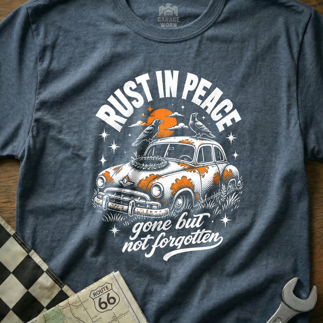 Graphic tee with vintage car, birds, and text "Rust in Peace, gone but not forgotten."