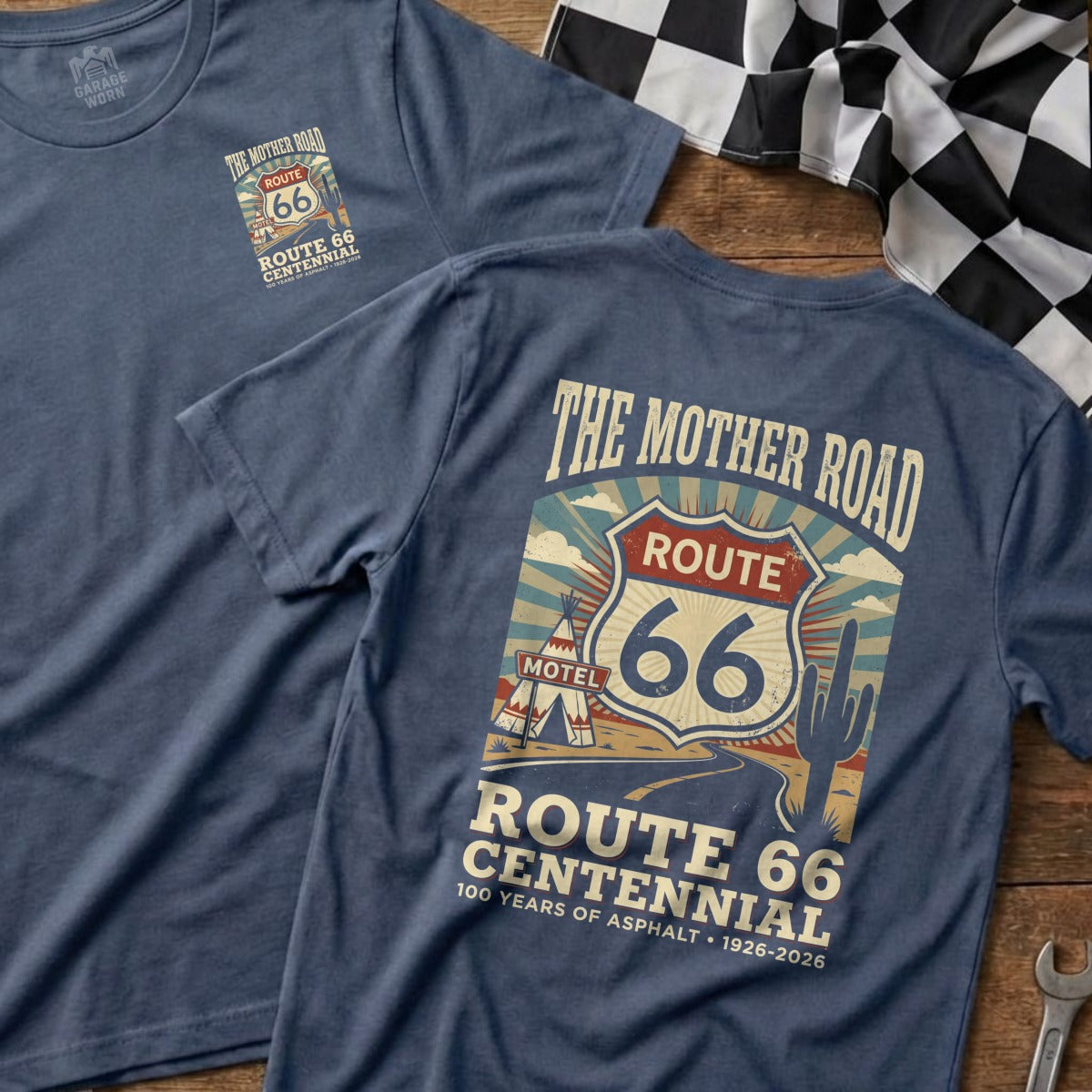 T-shirts with "Route 66 Centennial" graphic featuring desert landscape and motel sign.