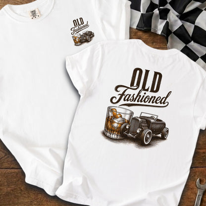 White t-shirt with "Old Fashioned" text and illustration of a whiskey glass and hot rod car.