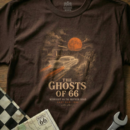 T-shirt graphic: spectral car, Route 66 sign, gas station, full moon, text "The Ghosts of 66".