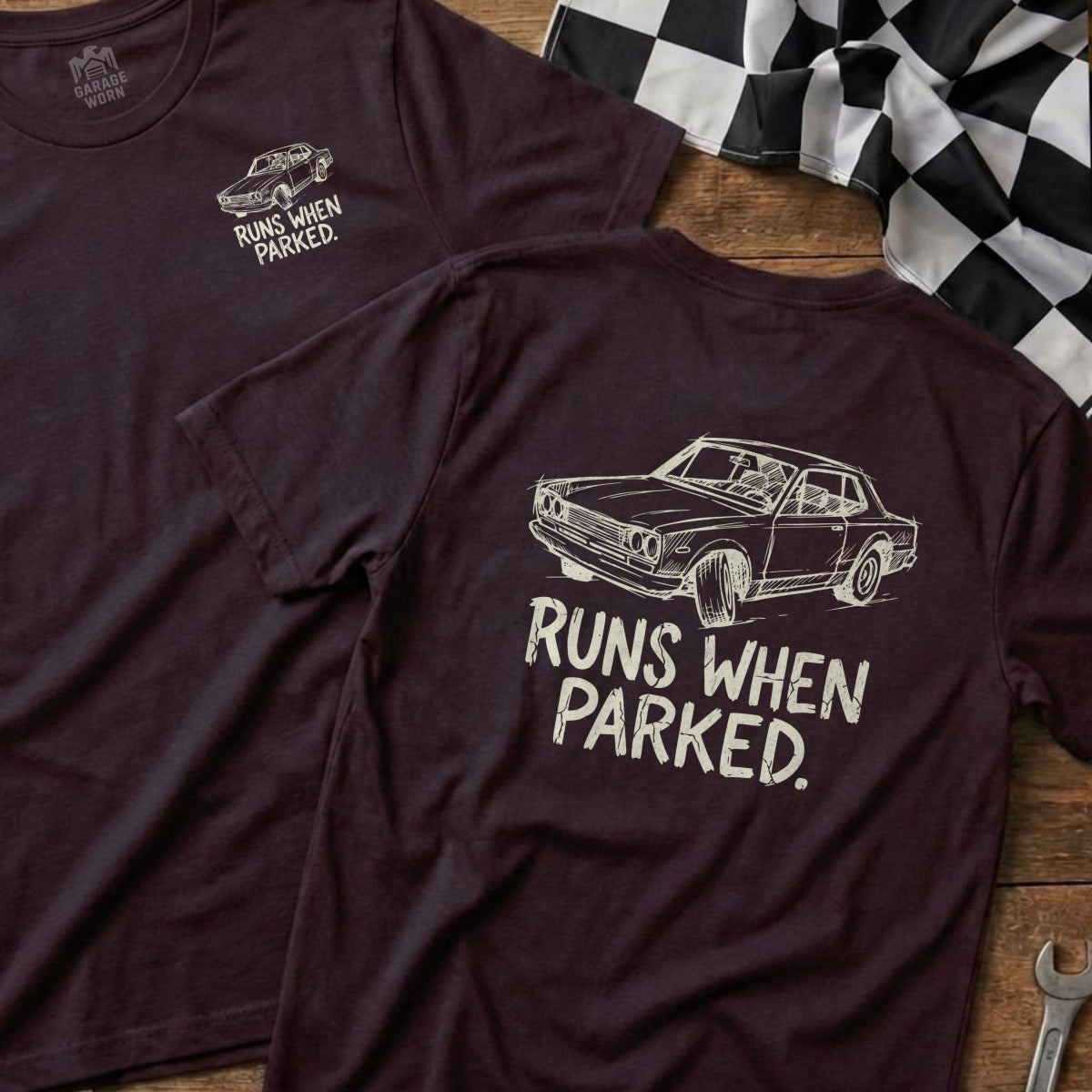 Maroon t-shirt with sketch of vintage car and text "Runs When Parked."