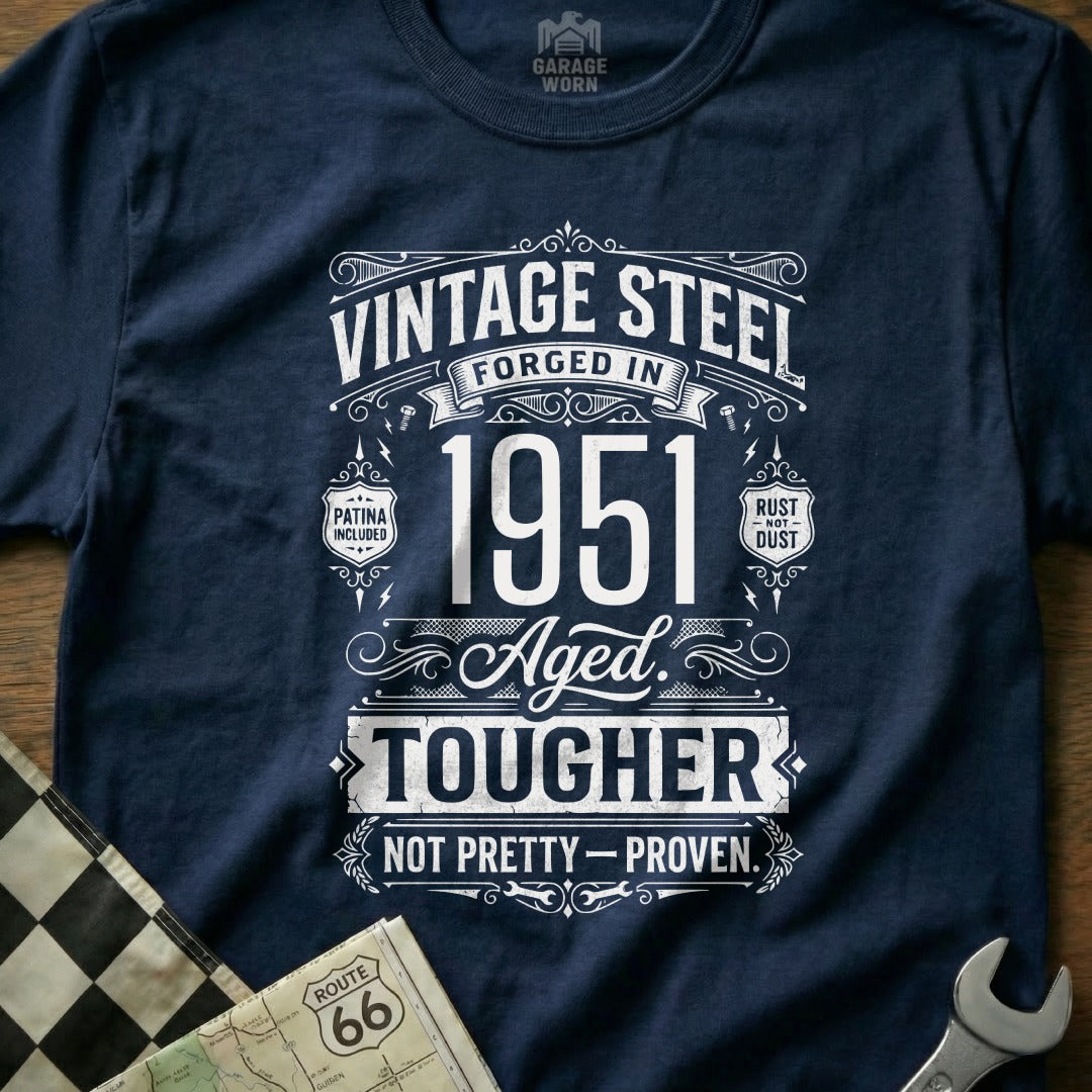 Dark blue t-shirt with "Vintage Steel Forged in 1951 Aged. Tougher" text.