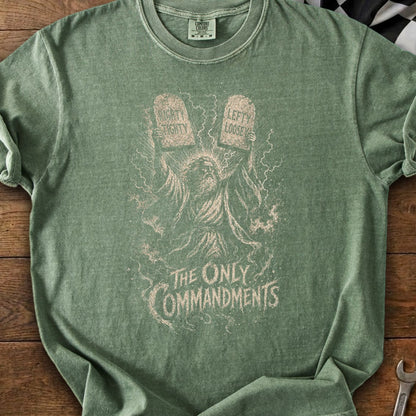 Green t-shirt with illustration of Moses holding tablets labeled "Righty Tighty" and "Lefty Loosey."