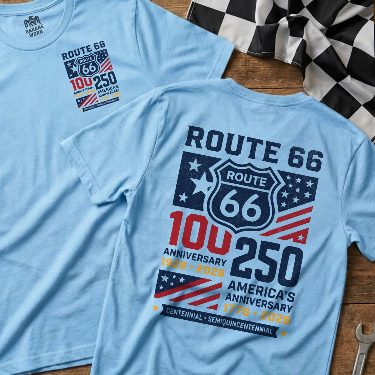 Blue t-shirt celebrating Route 66's 100th anniversary with stars and stripes.