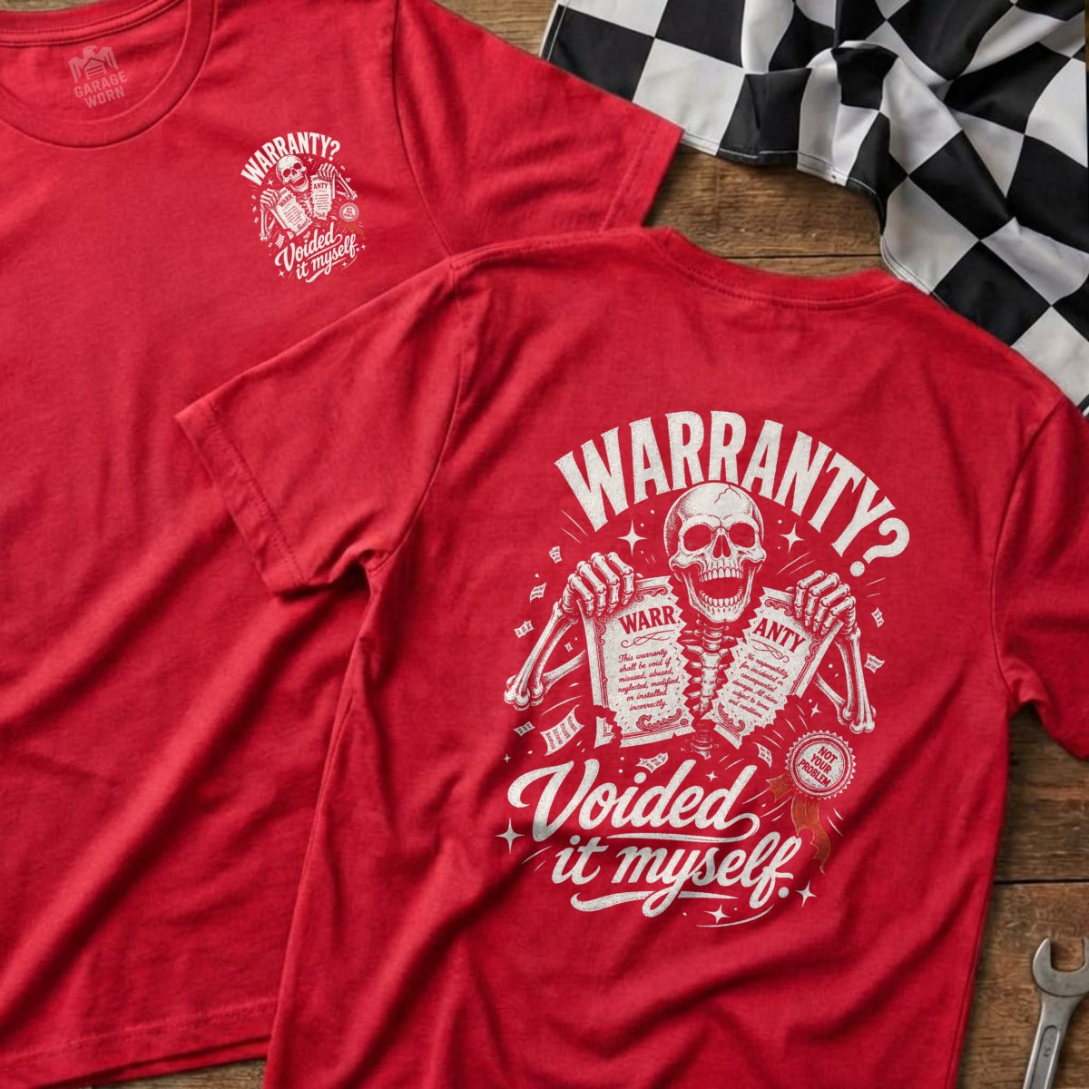 Red t-shirt with skeleton graphic and text "Warranty? Voided it myself."