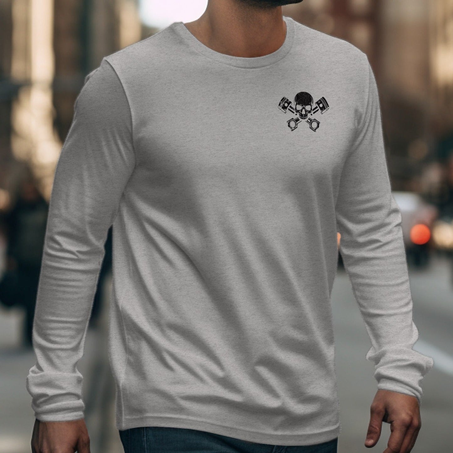 Gray long-sleeved shirt with black crossed pistons and skull logo on left chest.