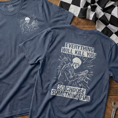 Navy t-shirt with a skeleton driver and text: "Everything will kill you, so choose something fun."