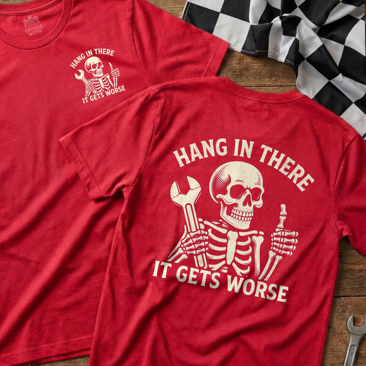 Red t-shirts with "Hang in There It Gets Worse" and skeleton holding wrench graphic.