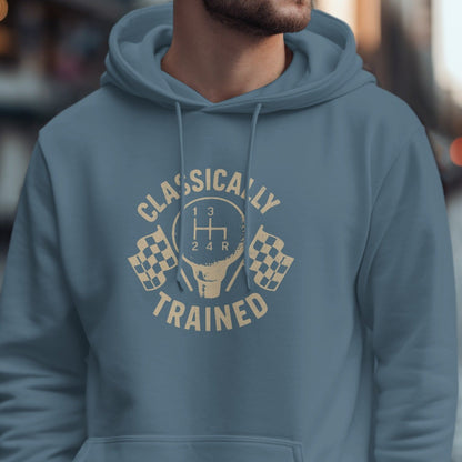 Blue hoodie with "Classically Trained" text and a manual gear shift graphic.
