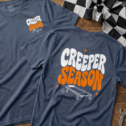 Navy t-shirts with "CREEPER SEASON" graphic and a rolling cot.