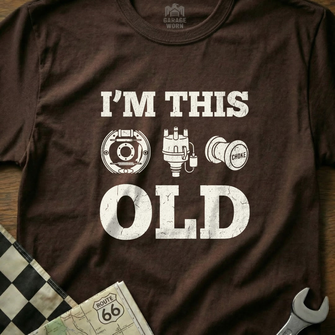 Brown t-shirt with "I'm this old" and car part graphics.