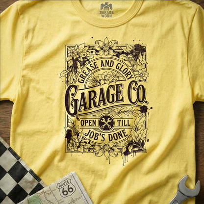 Yellow t-shirt with "Garage Co." logo, "Grease and Glory," and "Open Till Job's Done."